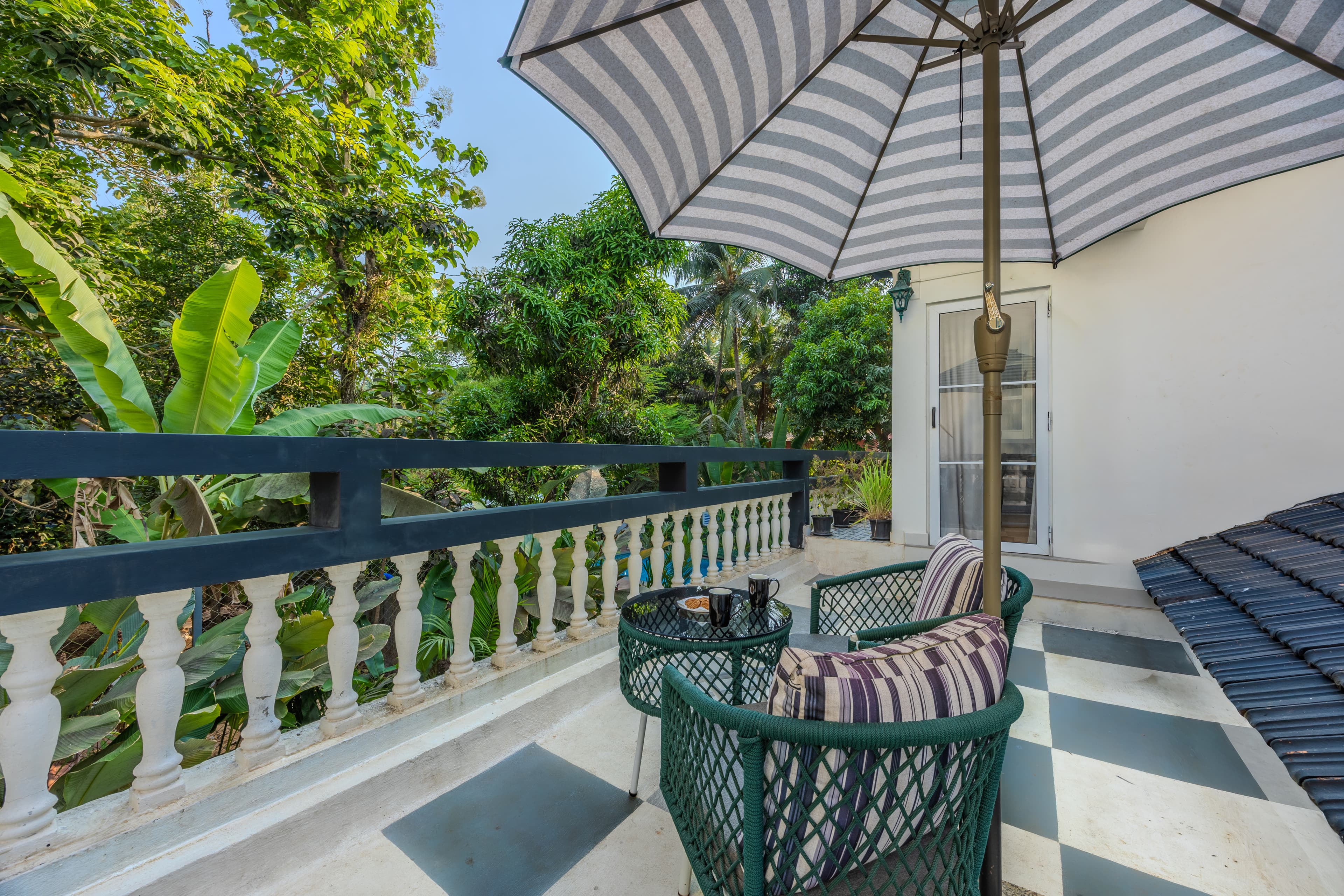 Goan Bliss Junior Suite | Spacious Boutique Suite with Living Room, Private Terrace, Shared Pool, Restro, Spa & Library - Image 5