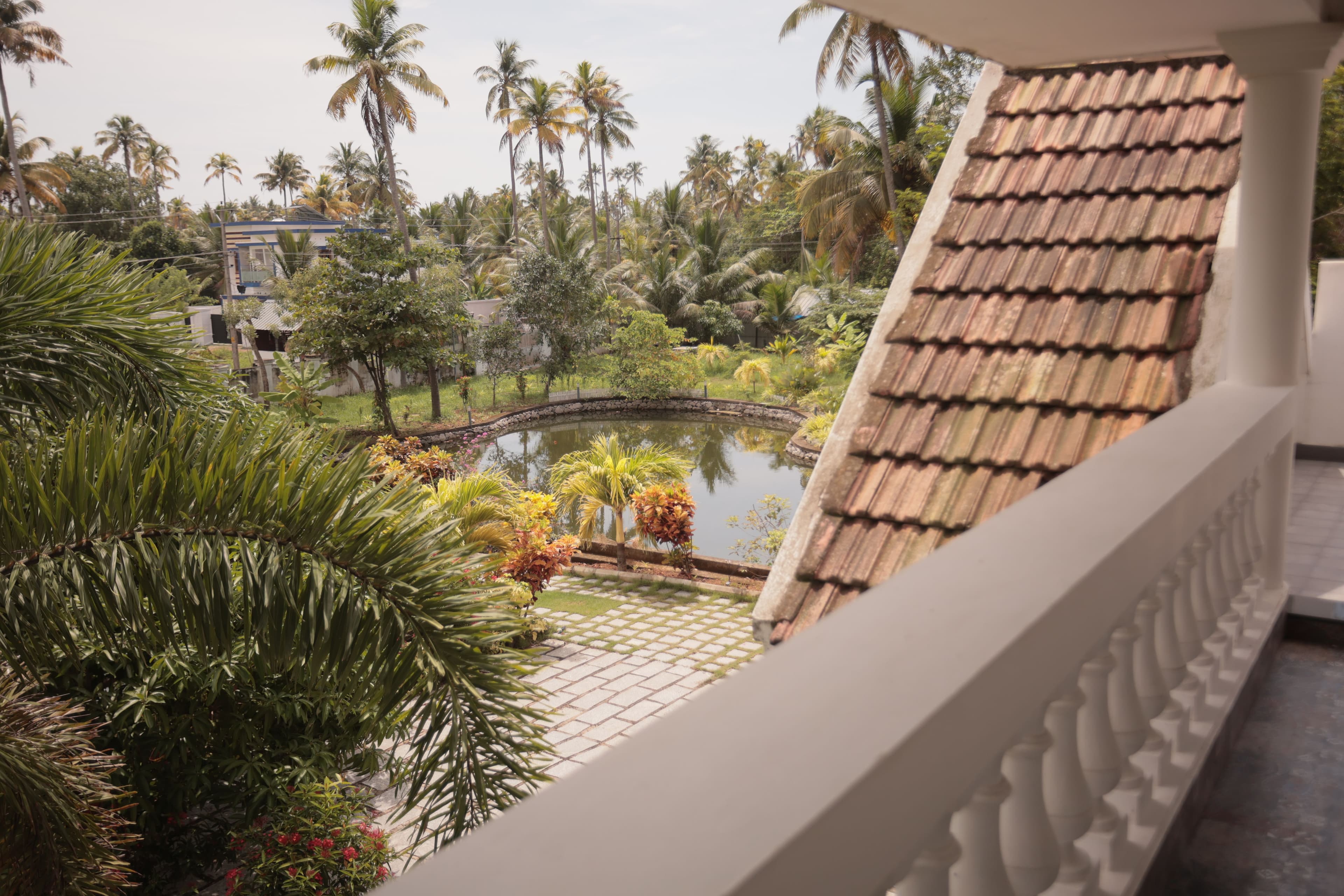 Palliath House |3-BHK With, Living Lounge, Patio, Shared Lawn and 3 Natural Ponds | Near Andhakaranazhi Beach - Image 38