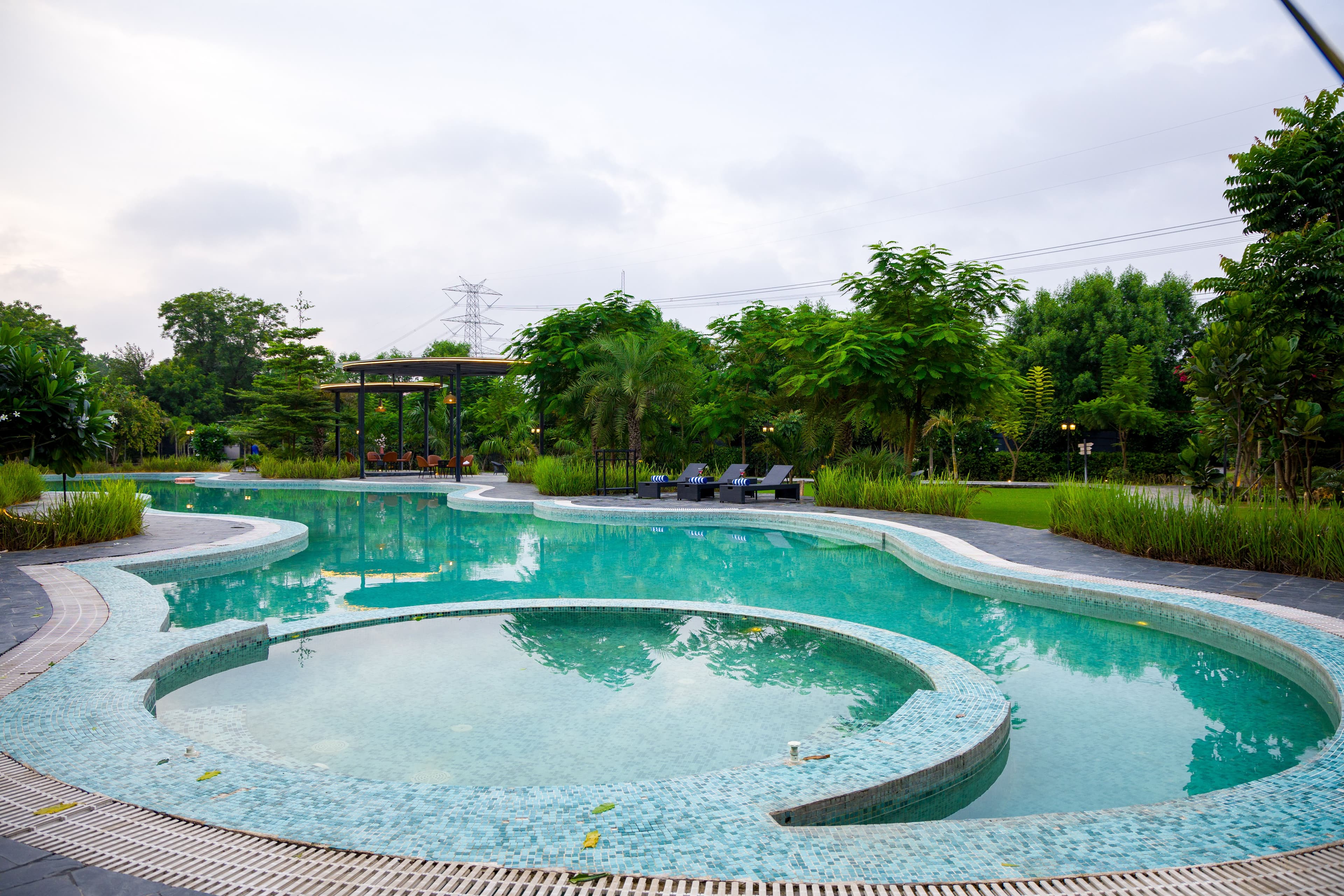 Raha Farms | 2-BHK Pet-friendly Retreat with a Garden, Shared pool, Restaurant, Library, & Game zone - Image 7
