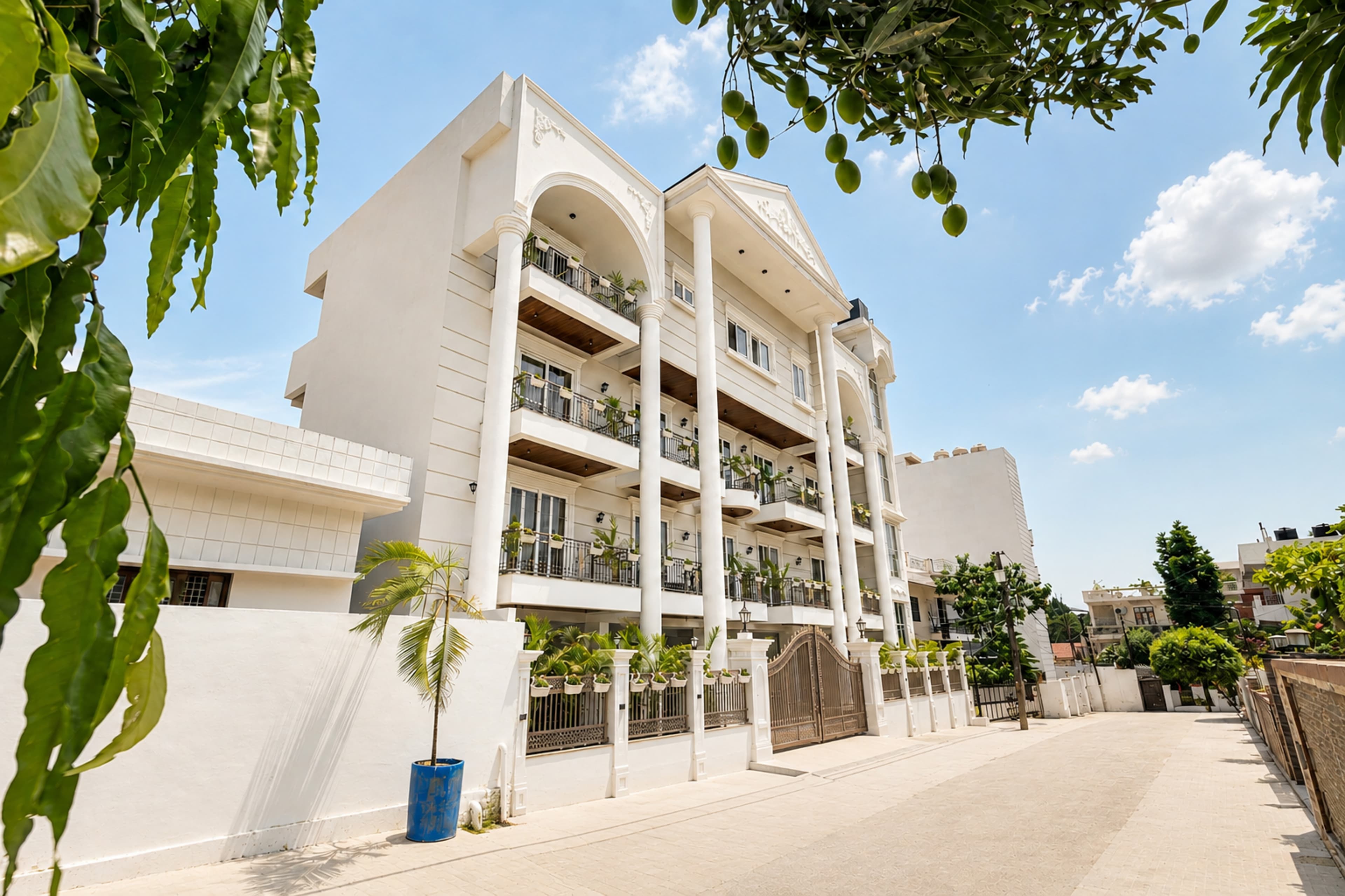 Kalyan Mansion Primrose | Elegant Room W/ Private Balcony, Shared Outdoor Space, Lift & Scenic Views - Image 15