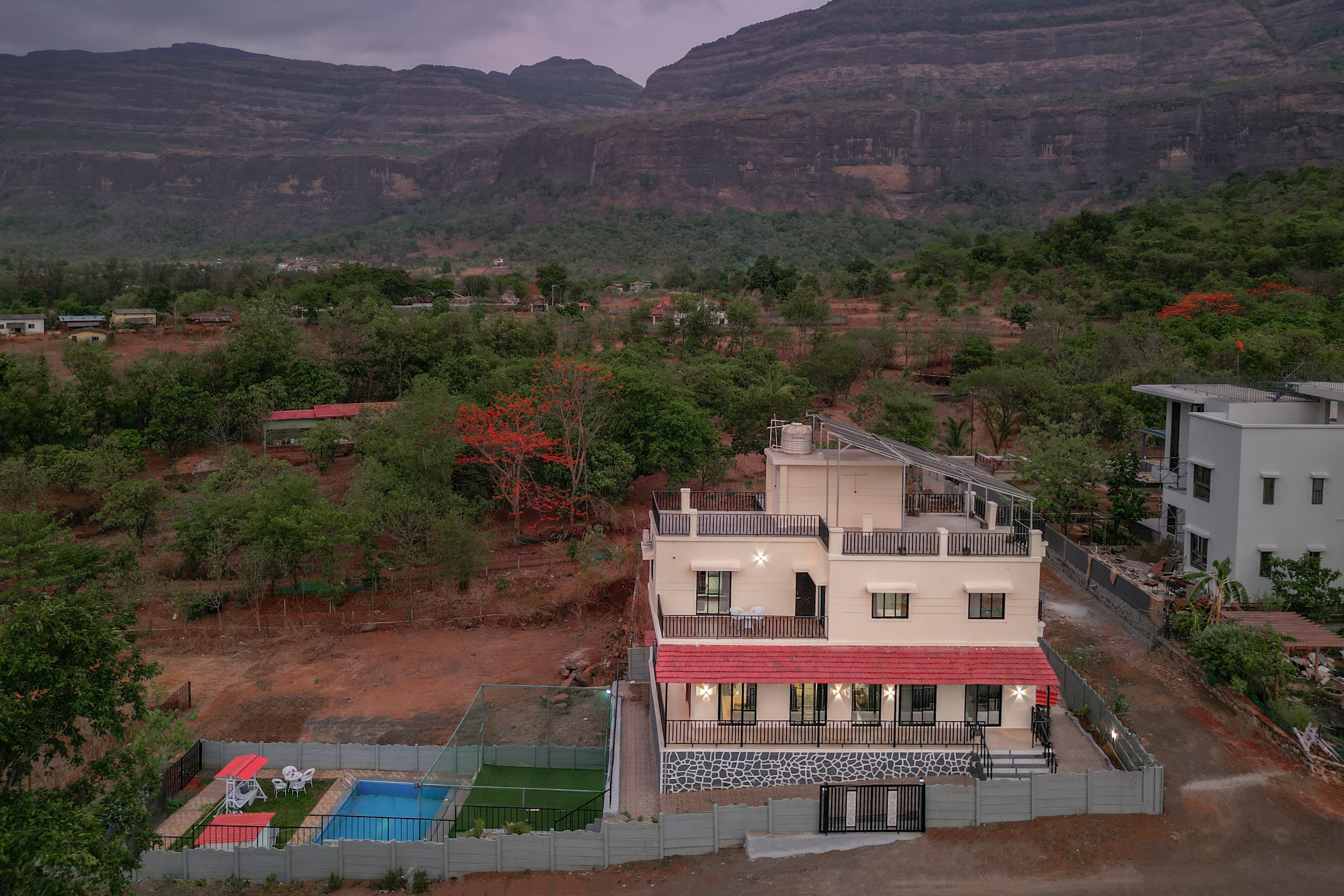 Ansh Villa | Luxury 4-BHK Pet-friendly Getaway with Private Pool, Lawn & Sports Turf | Near Solanpada Dam & Sahyadri Waterfall - Image 3