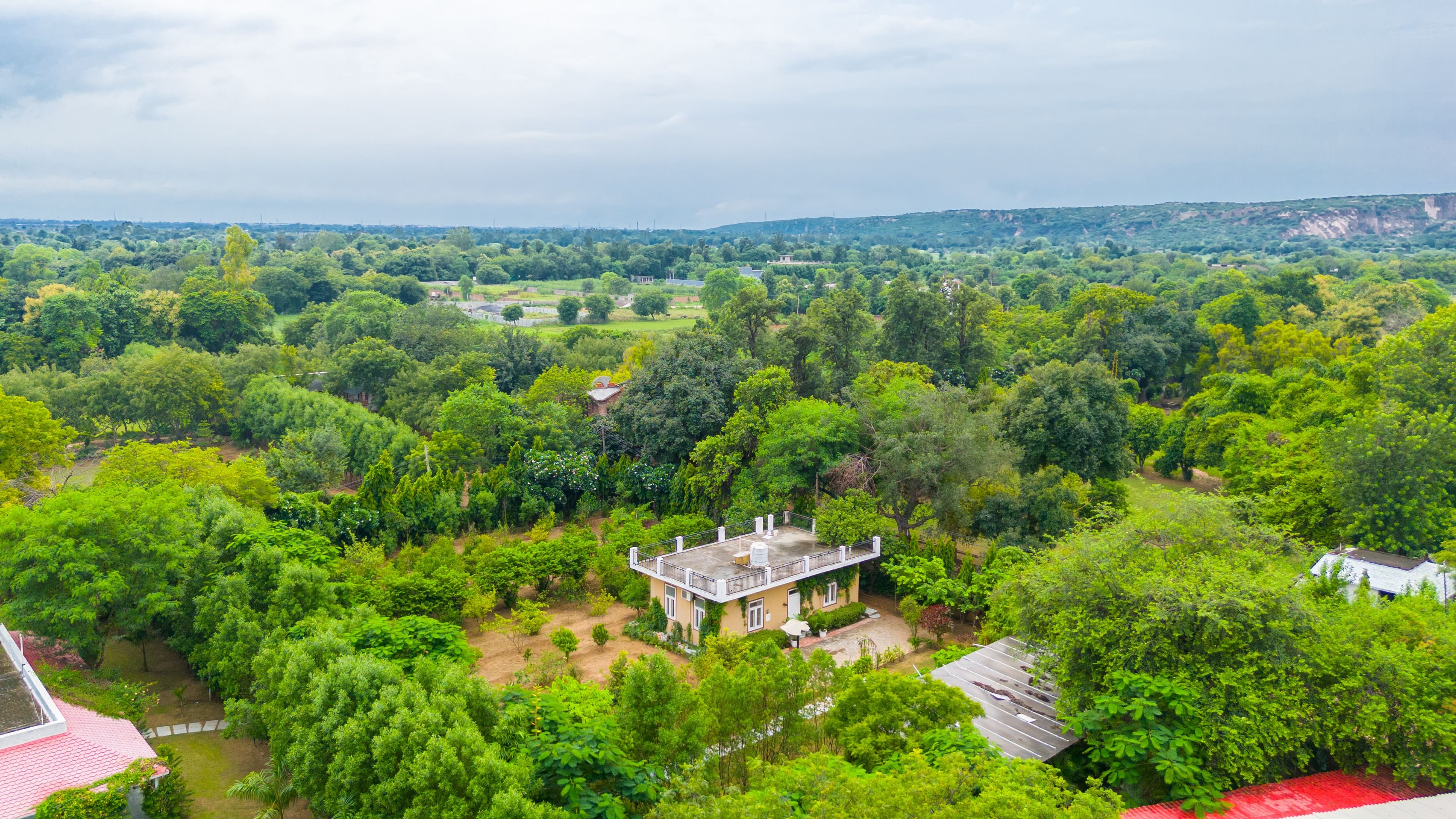 Raha Farms | 2-BHK Pet-friendly Retreat with a Garden, Shared pool, Restaurant, Library, & Game zone - Image 3