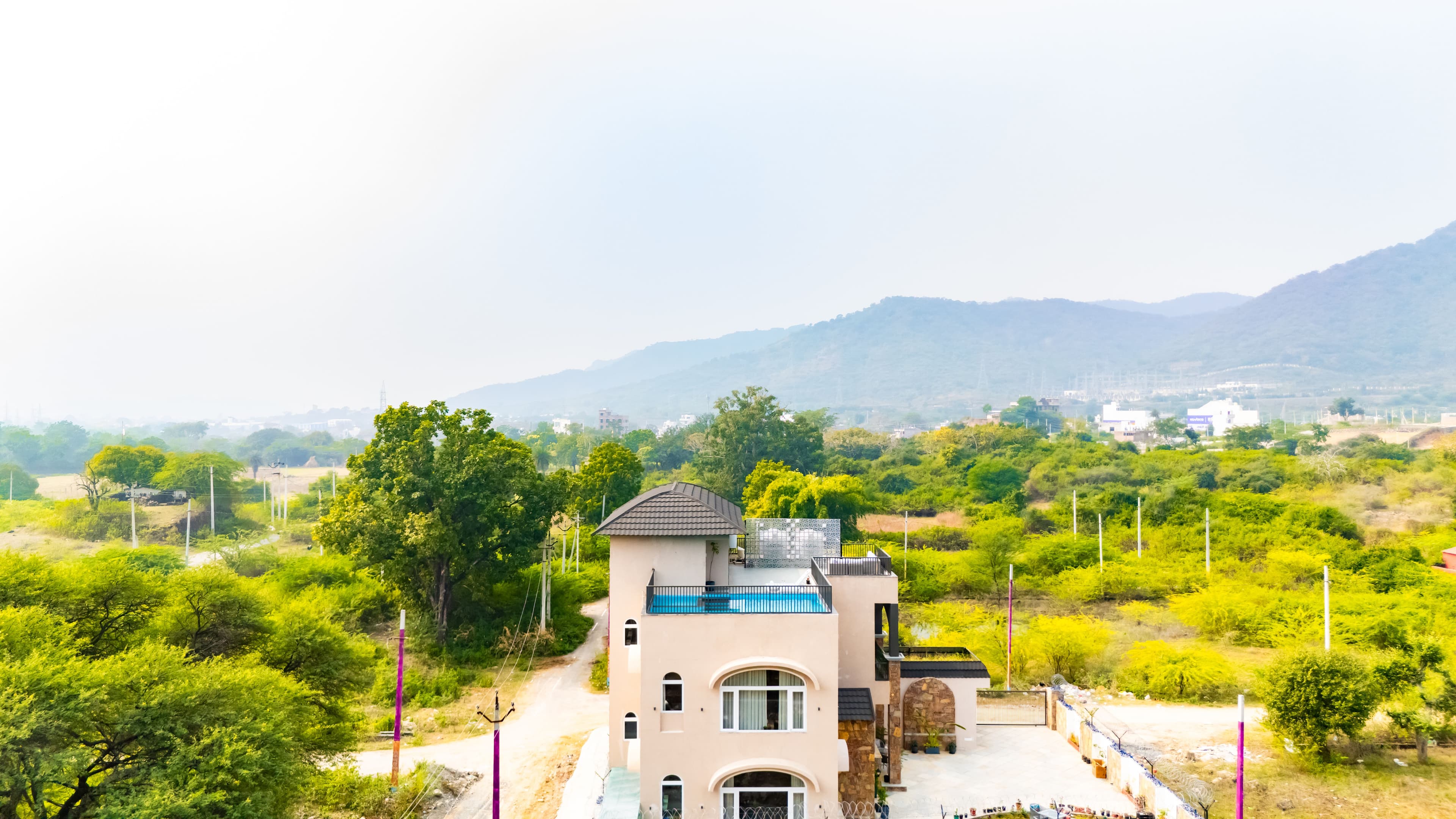 Vaikunth Villa | 3-BHK Getaway with Rooftop Pool, Sit-out Area, Jacuzzi, Scenic Lake & Hill Views - Image 2
