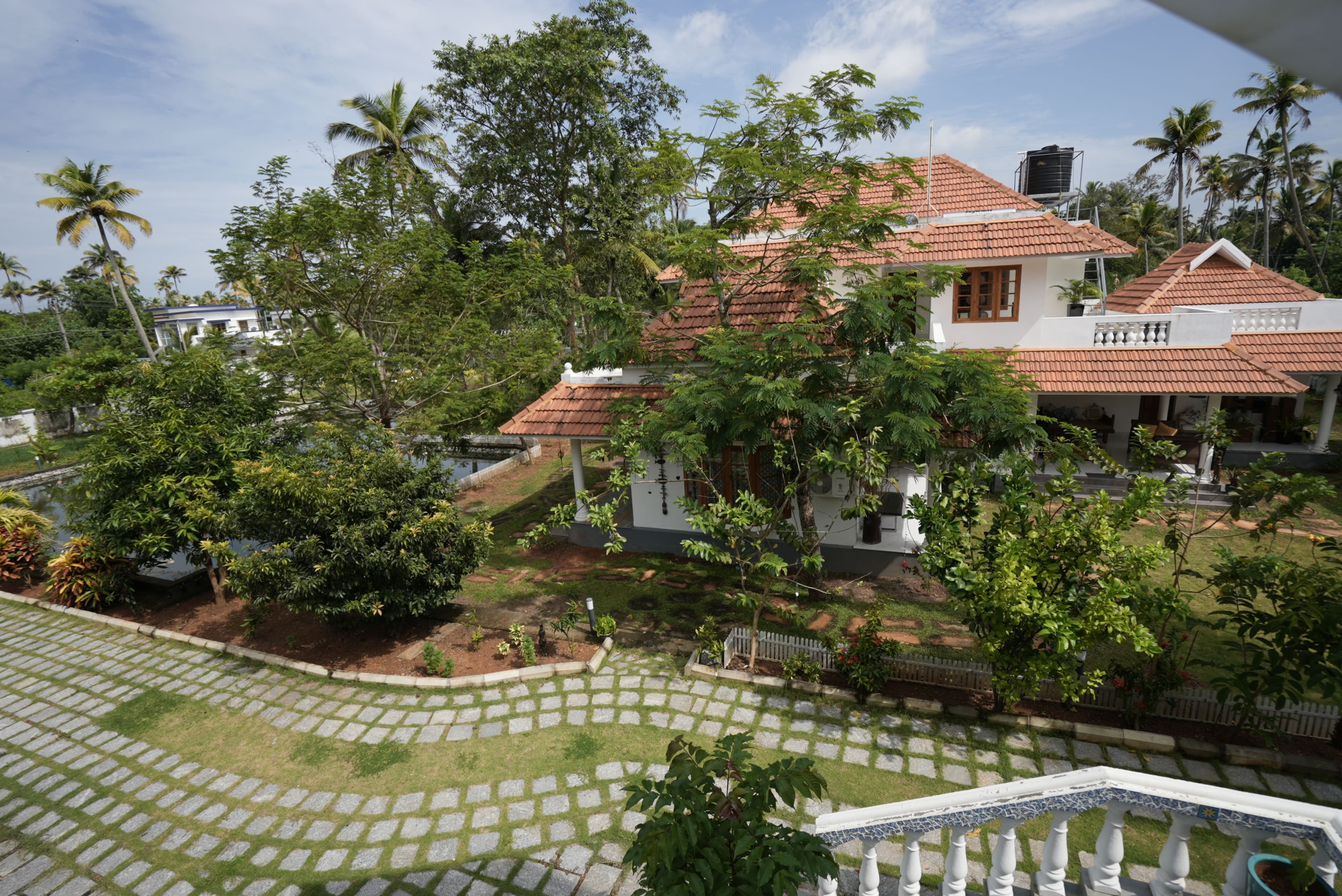 Palliath House |3-BHK With, Living Lounge, Patio, Shared Lawn and 3 Natural Ponds | Near Andhakaranazhi Beach - Image 8