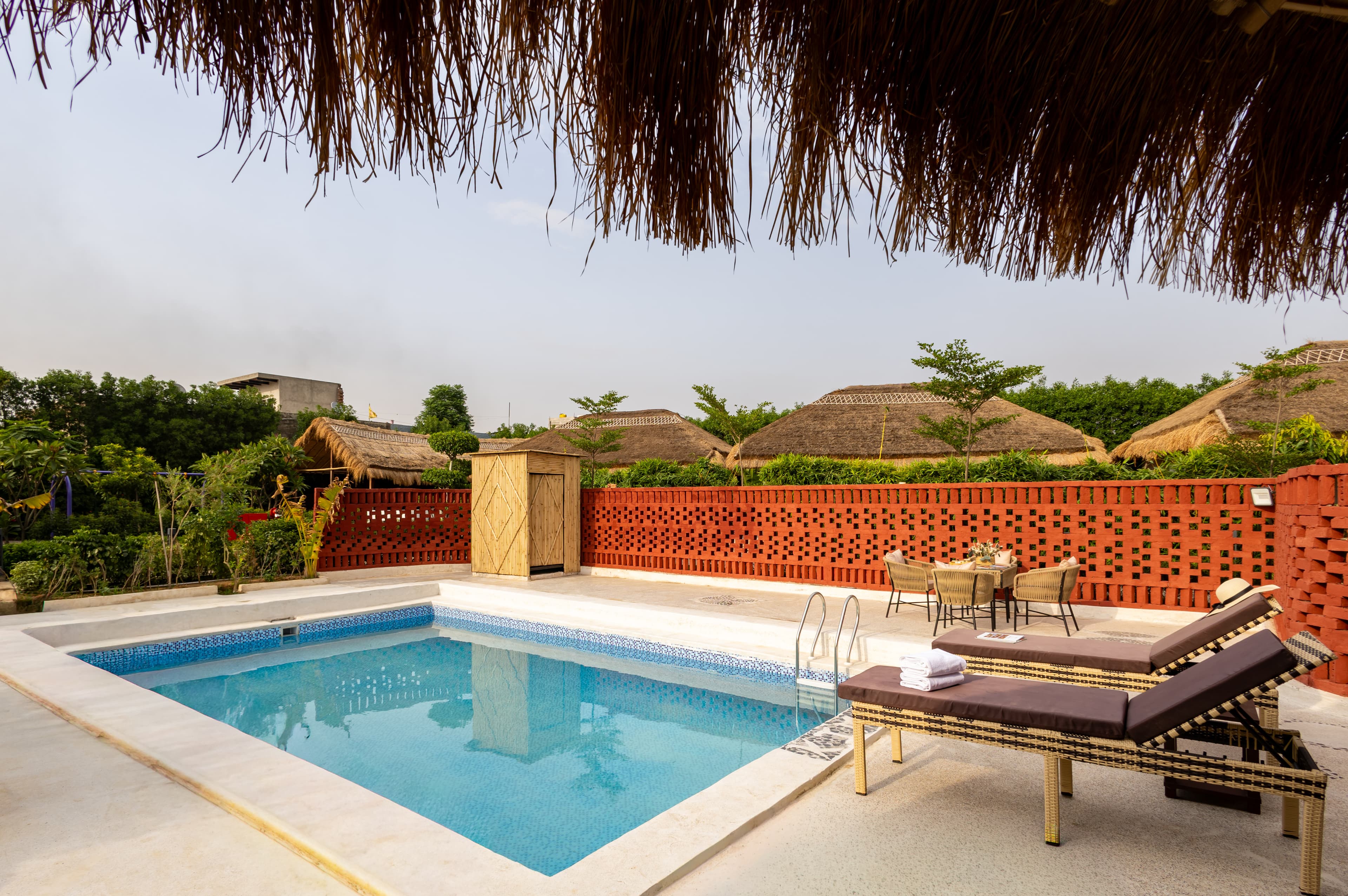 Kimaya Kove | Hut-Style Cottage with Open-Air Shower, Shared Pool, Restaurant, and Garden in Boutique Resort - Image 2
