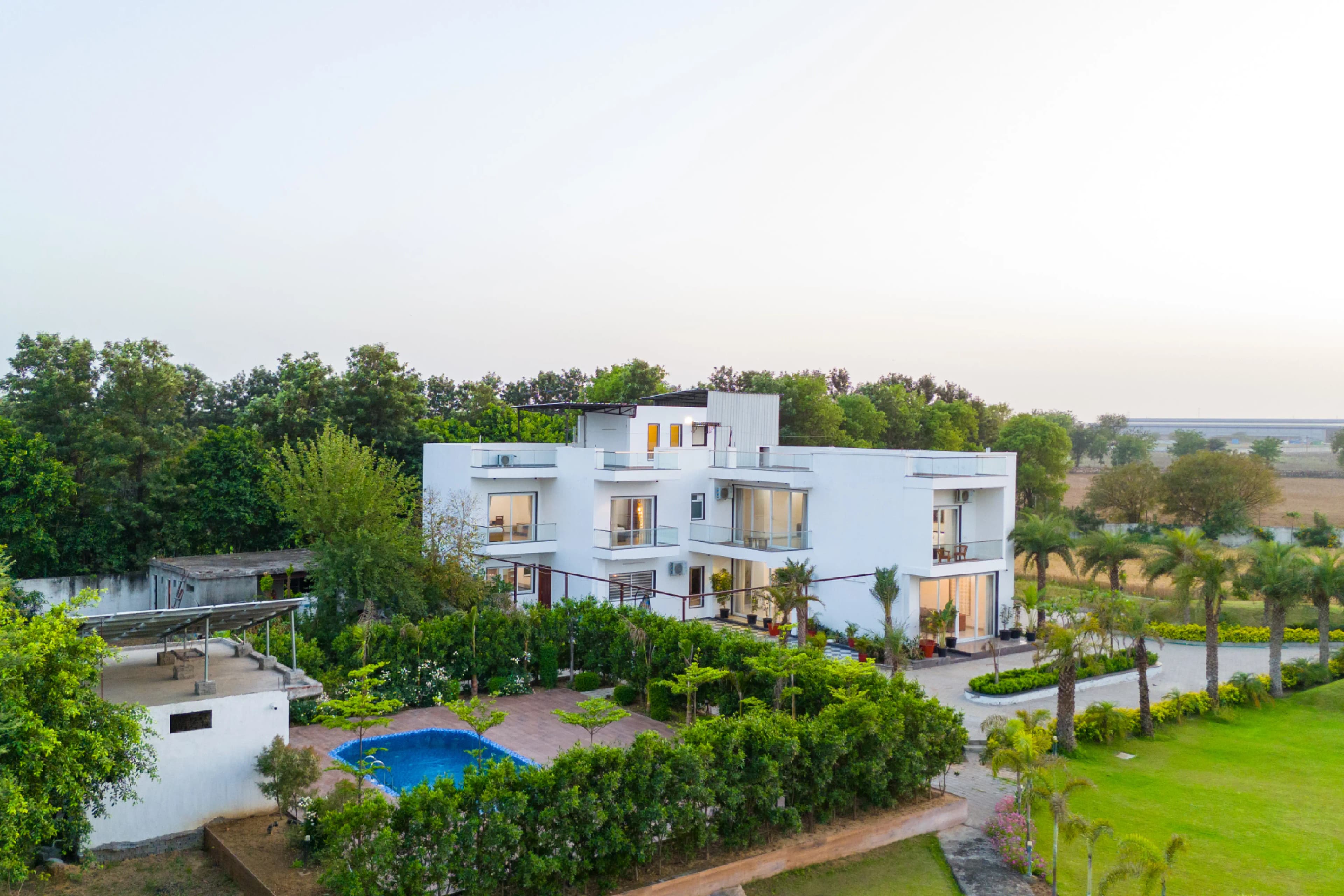 AdhiVa Retreat | 5-BHK Pet-friendly Farmhouse with Private Pool, Bar & Lush Garden - Image 44
