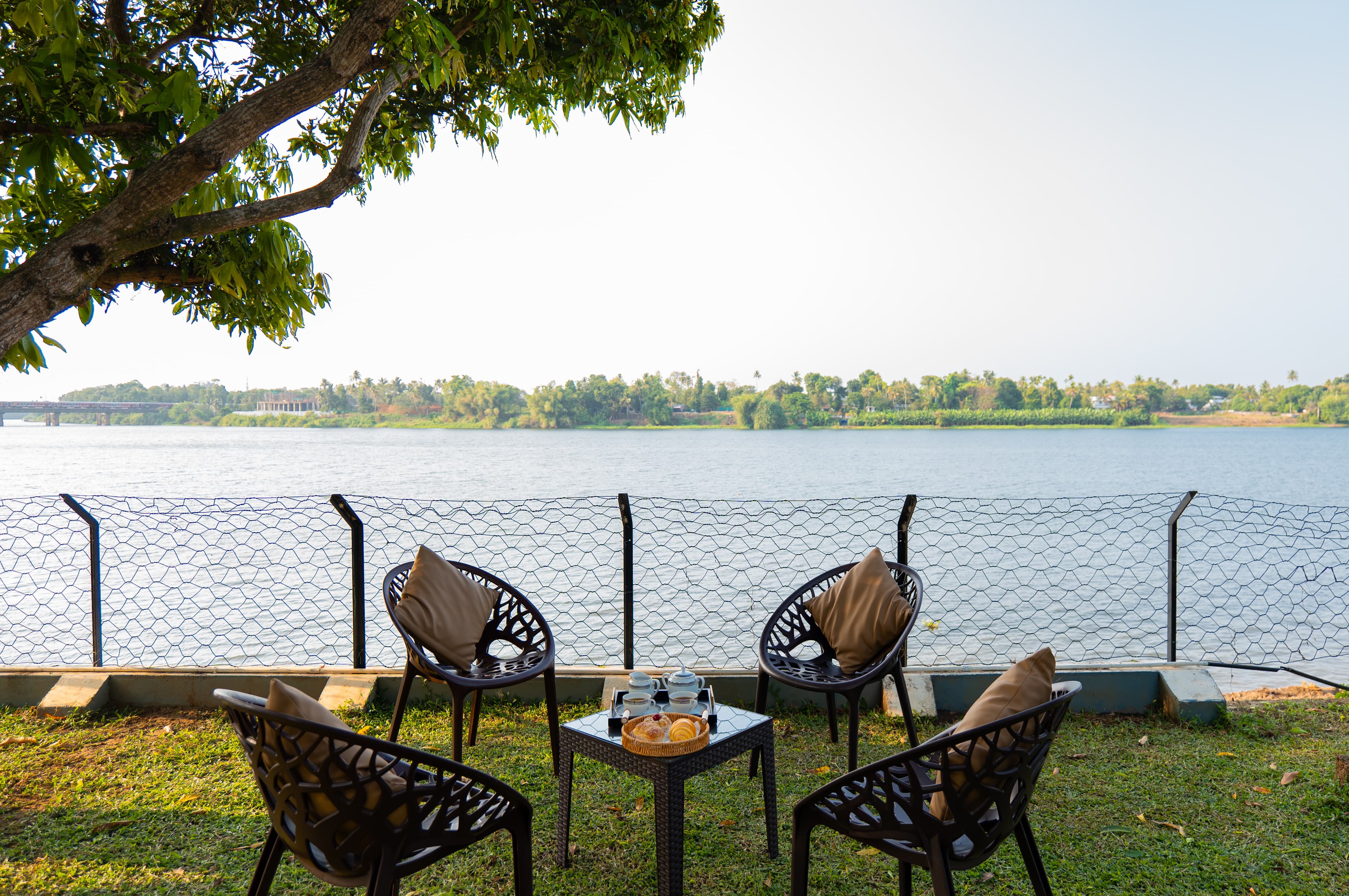 Glass River Retreat | 4-BHK Riverside Getaway with Private Pool, Lakeside Sit-Out & Lounge Area Near Aluva Railway & Metro Station - Image 30