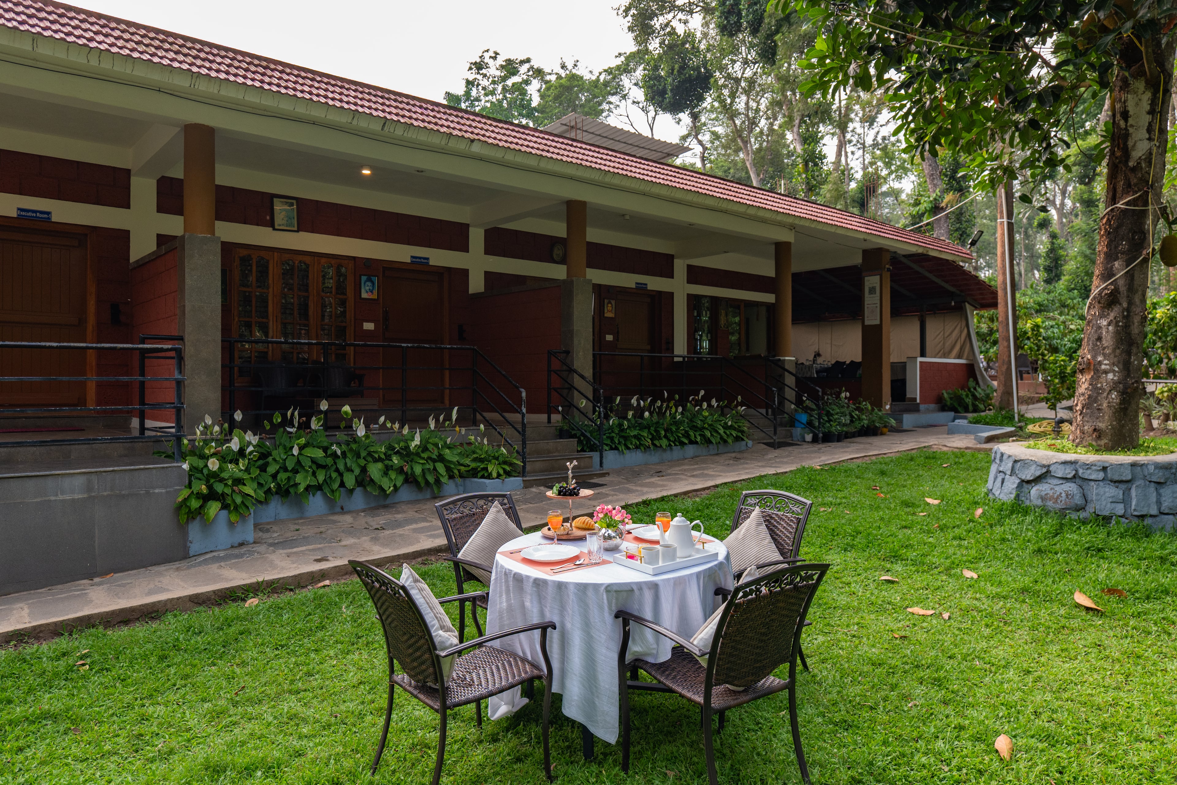 Avocado Cottages Executive Room | Pet-friendly Stay With Private Patio & Common Garden Amid Avocado & Coffee Estate Plantation — photo 2
